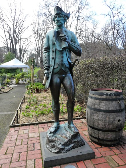 Life-sized statue of Captain Cook in the herb garden